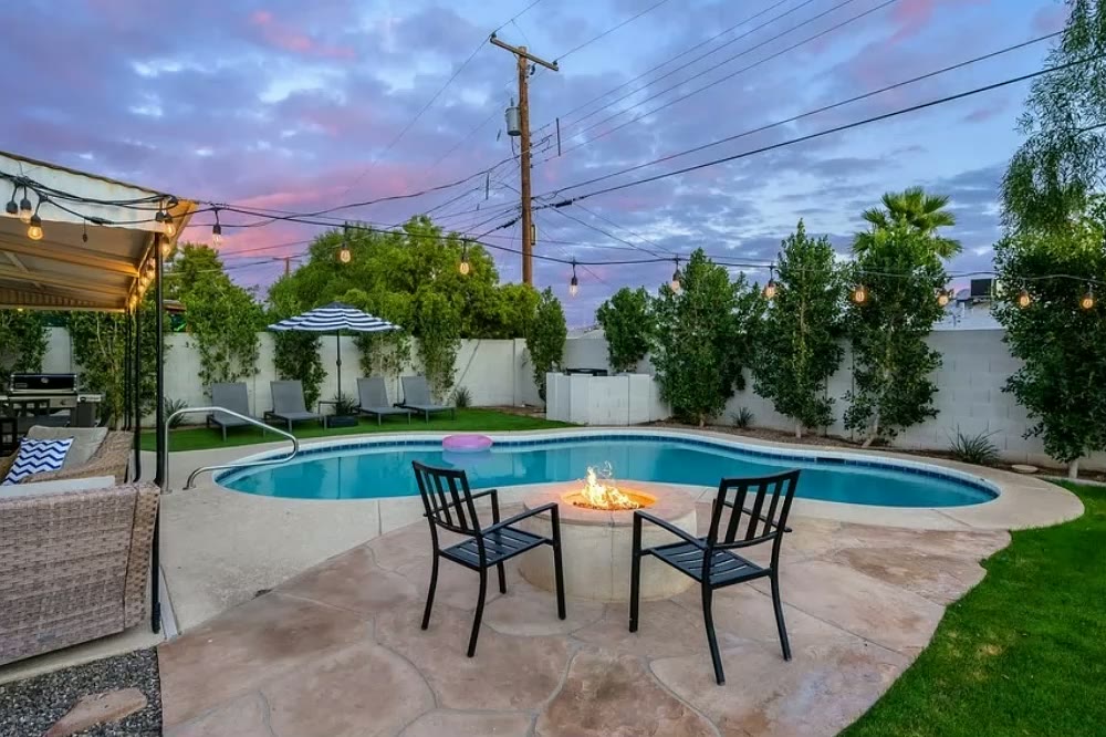 Backyard pool at sunset, still photo